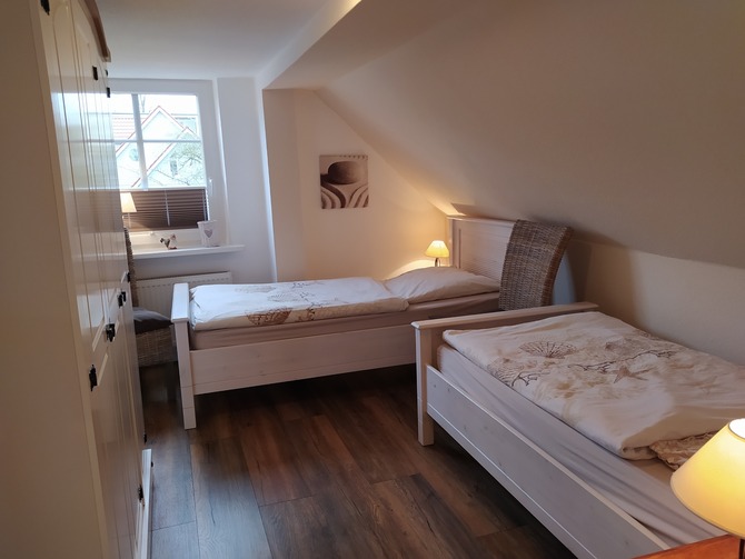 Ferienwohnung in Heiligenhafen - Eckhoff - Schlafzimmer mit zwei Einzelbetten