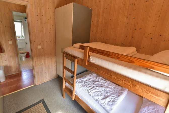 Ferienhaus in Pelzerhaken - Am Waldrand Haus A - Schlafzimmer mit Etagenbett