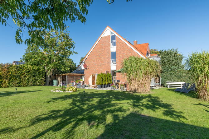 Ferienwohnung in Feldhusen - Diana EG Terrasse - Garten Ansicht