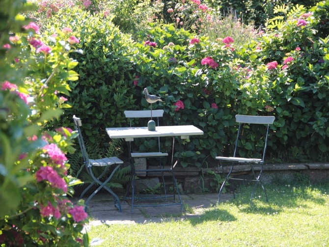 Ferienwohnung in Scharbeutz - Strandkorb - Sitzecke im Garten