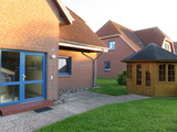 Ferienwohnung in Fehmarn OT Petersdorf - Ferienwohnung Bartels Kiebitzweg mit Balkon - Gartenhaus für Fahrräder und Sportgeräte